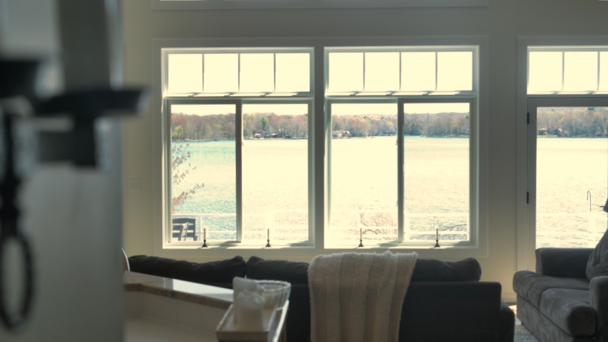 Finished interior of a Wrona Construction renovation with large lake-view windows