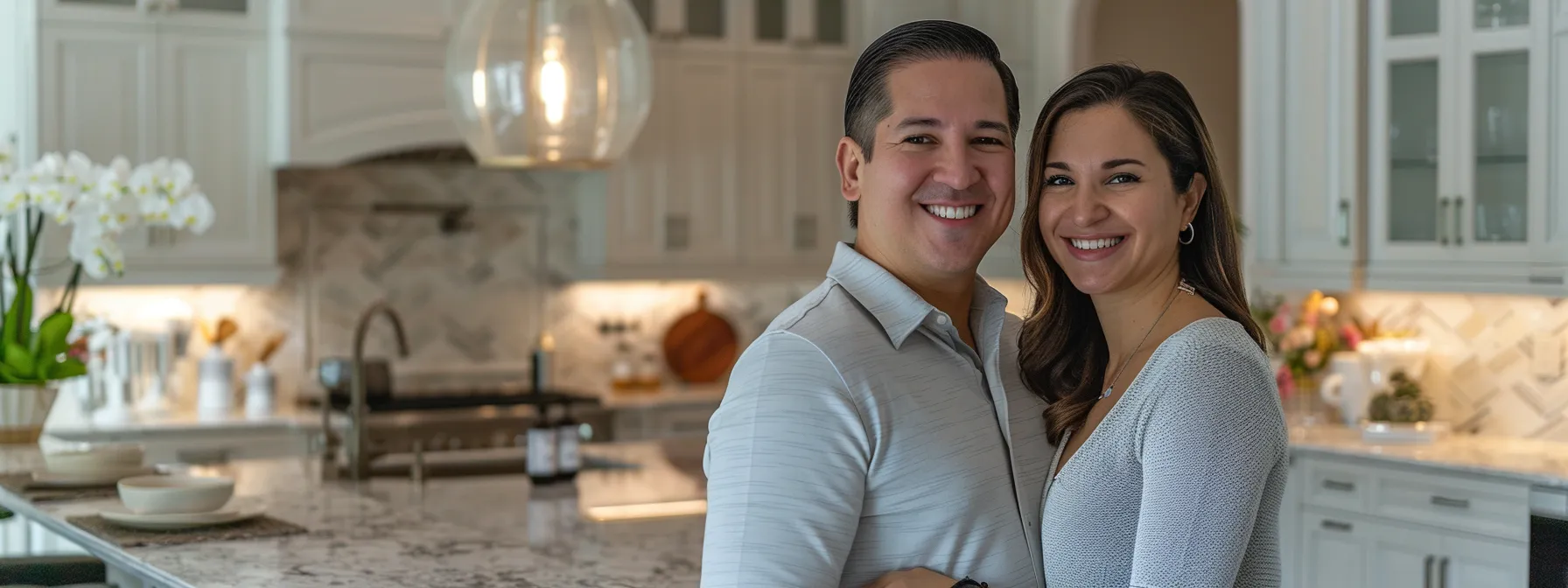 a couple smiling happily in their newly renovated kitchen, admiring the high-quality workmanship and attention to detail by trusted professionals.