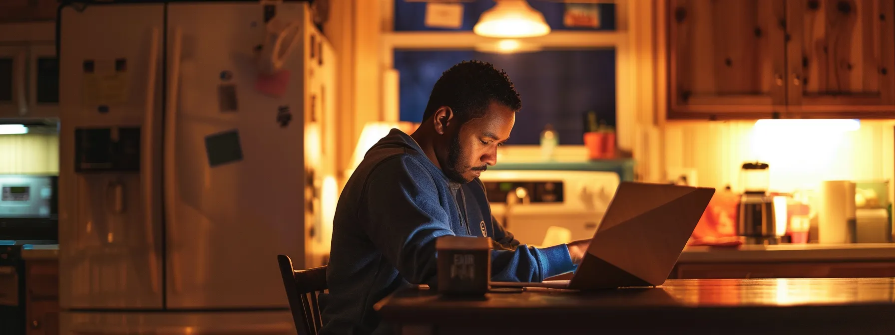 a homeowner carefully reading glowing online reviews and testimonials on a laptop while sitting at their kitchen table.