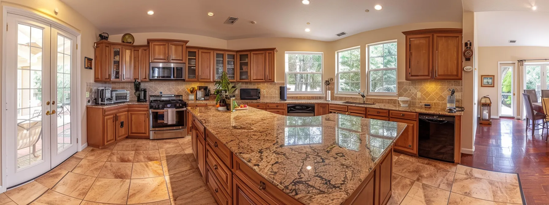 a spacious, modern kitchen with sleek granite countertops, reflecting a busy family lifestyle with durable and stylish design choices.